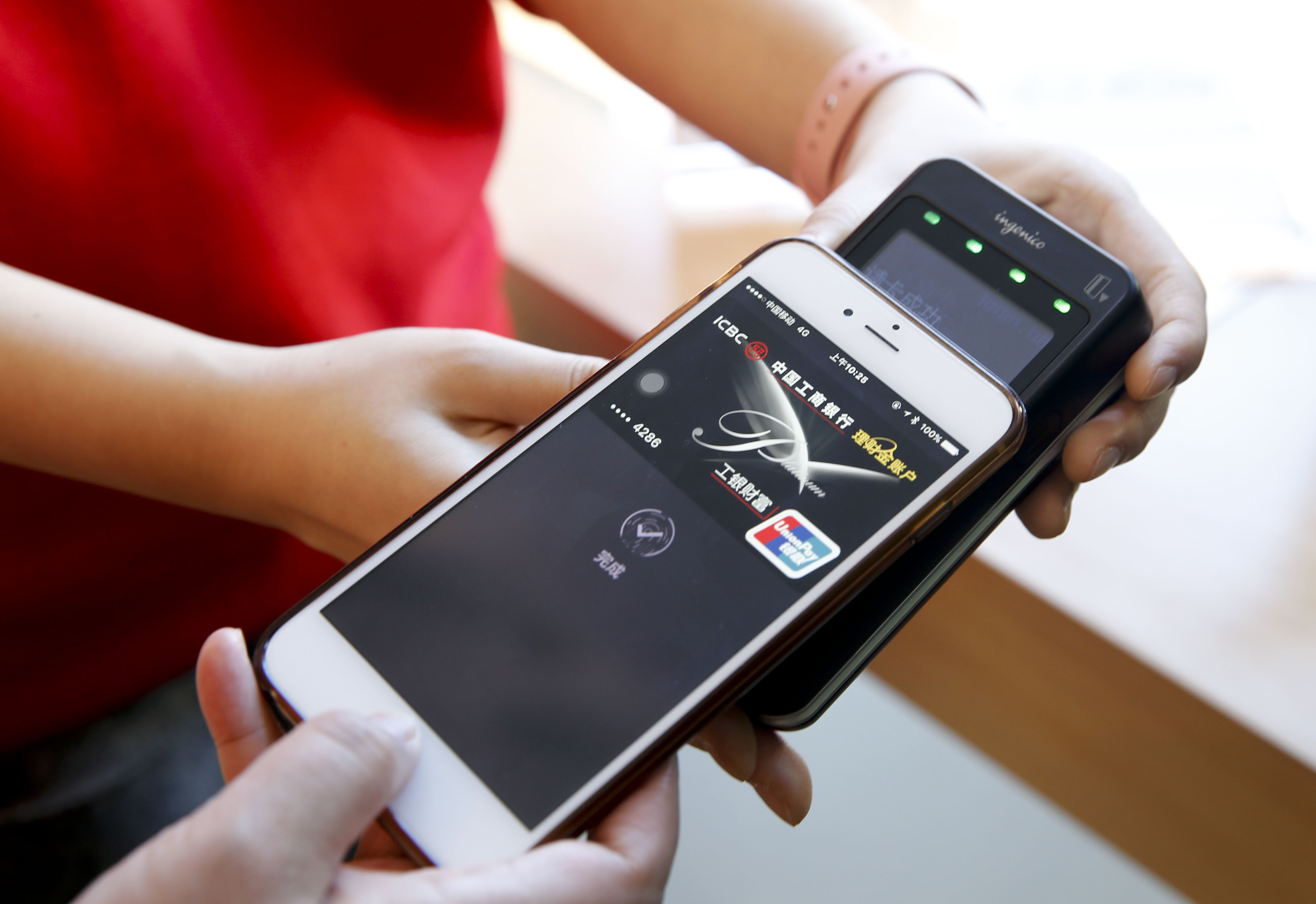 蘋果目前的NFC技術主要用於無線支付。（中新社資料圖片）