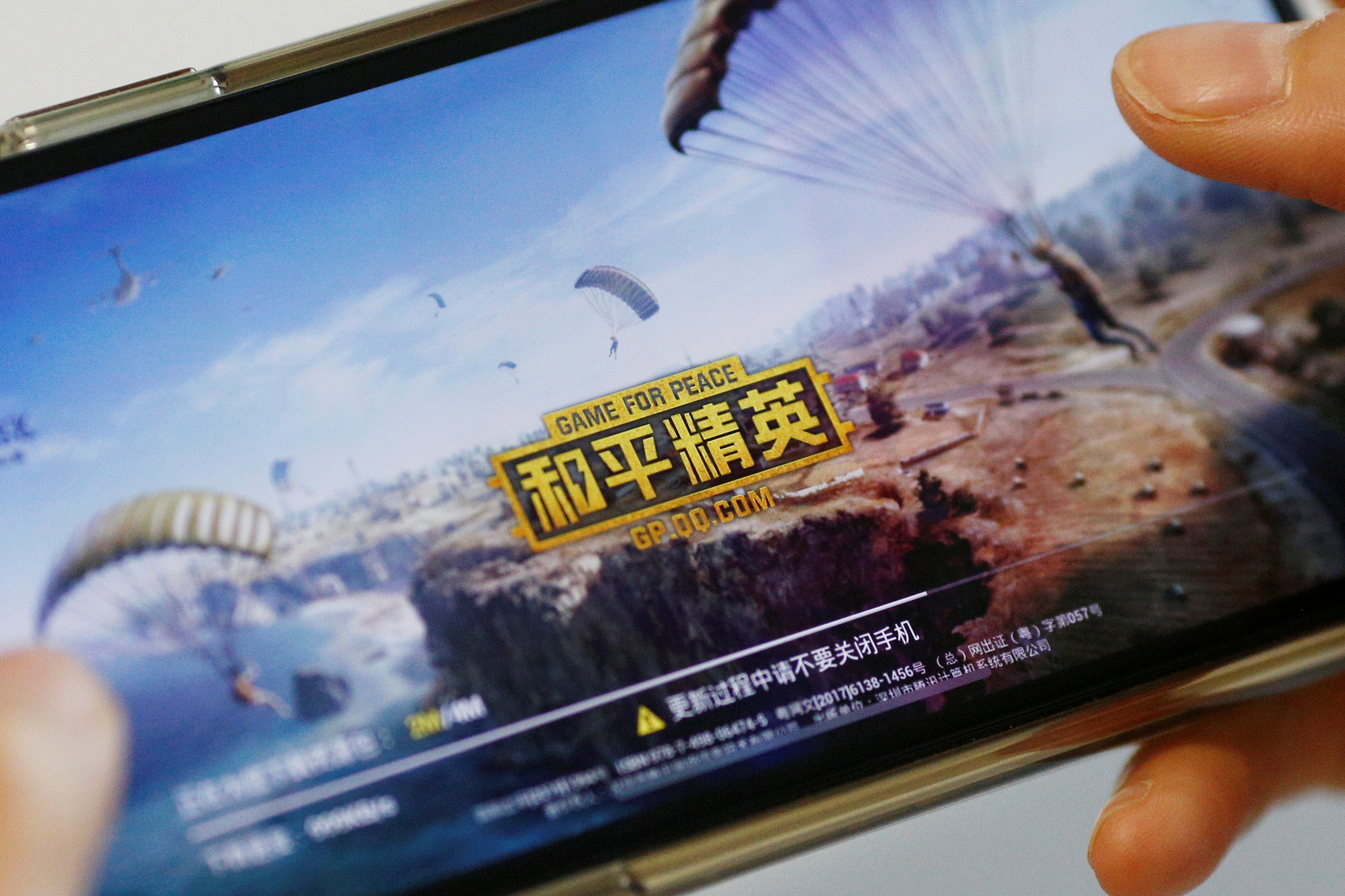 騰訊五月推出的大熱手機遊戲《和平精英》，其收入估計未來數季可入賬。（路透資料圖片）