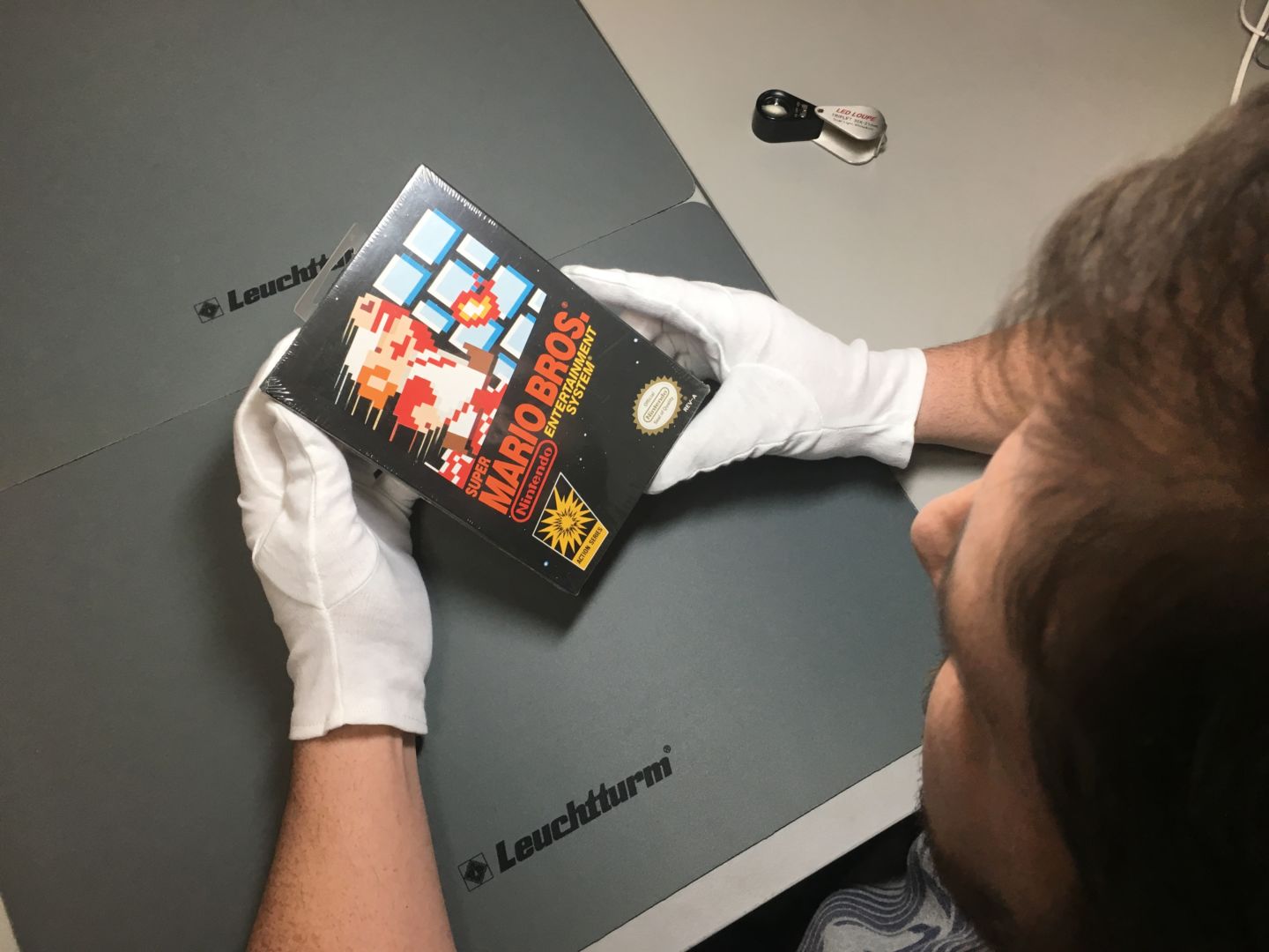 今次拍賣的《孖寶兄弟》遊戲，其外盒以保鮮紙密封，評分達最高等級的9.4分。（Wata Games網上圖片）
