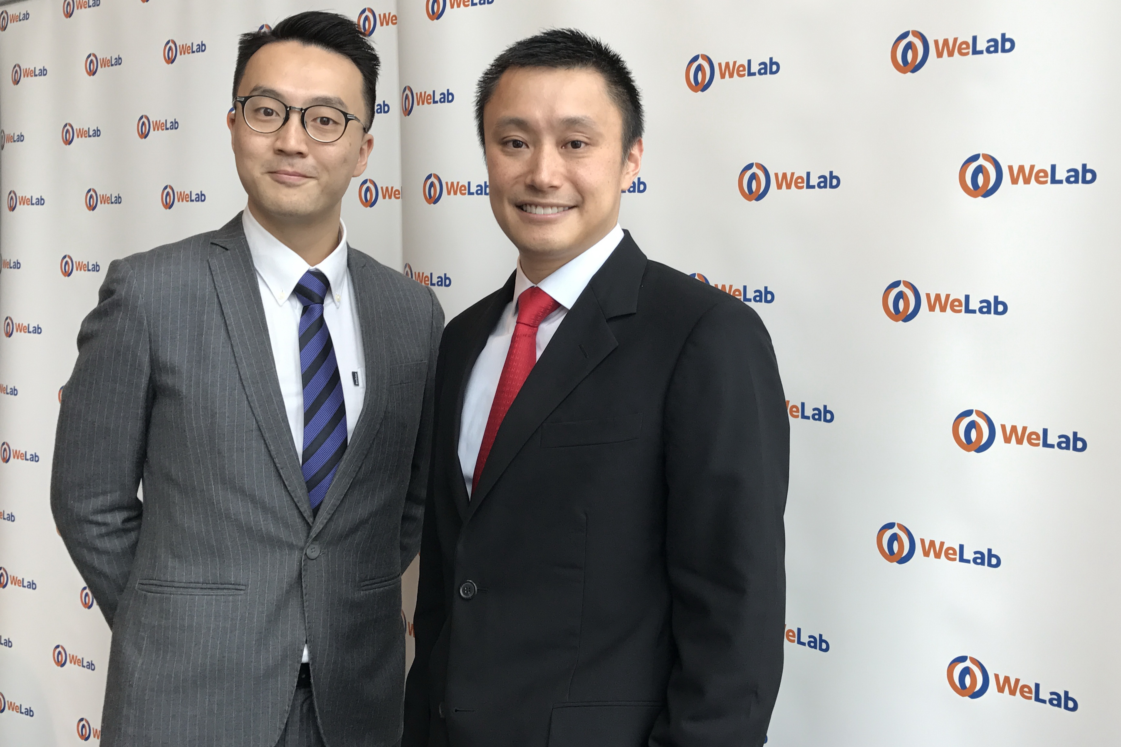 現時署任行政總裁的李家達（左一），加入WeLab集團已超過7年；旁為WeLab創辦人兼集團行政總裁龍沛智。（信報資料圖片）
