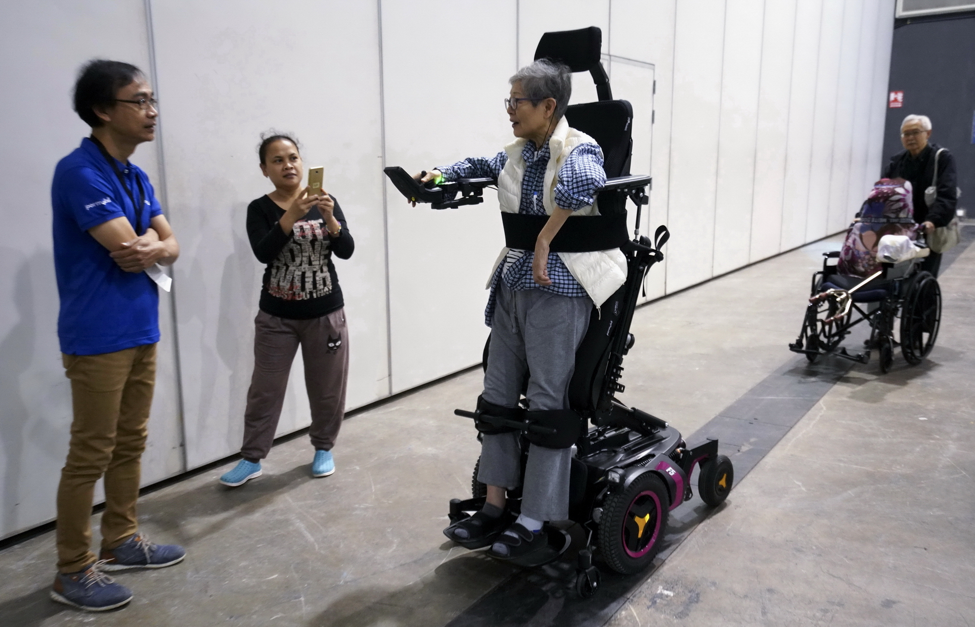 輪椅電動助推器等讓創新科技，重新定義殘疾人士出行的體驗。（中新社資料圖片）