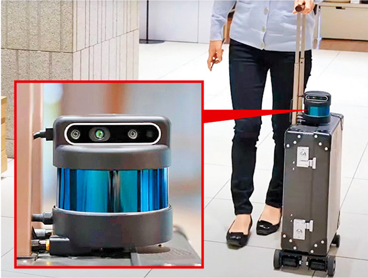 機械人外形如行李篋，加裝了傳感器（小圖）及摩打等組件。（YouTube影片截圖）
