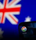 Smartphone with google app icon is seen in front of the displayed Australian flag in this illustration taken, January 22, 2021. REUTERS/Dado Ruvic/Illustration